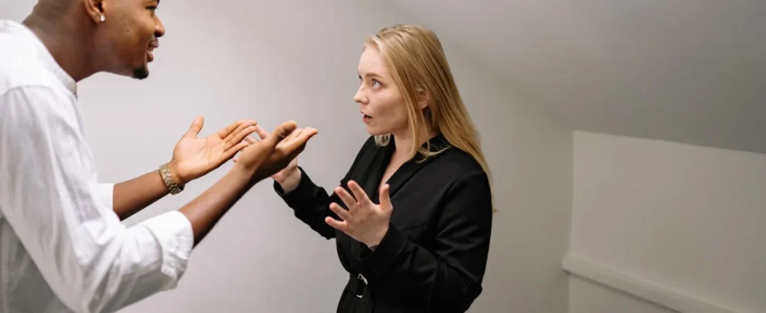Couple in a tense discussion at home