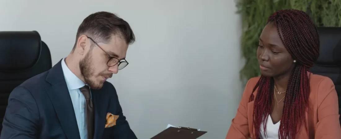 Employee meeting with a manager in an office