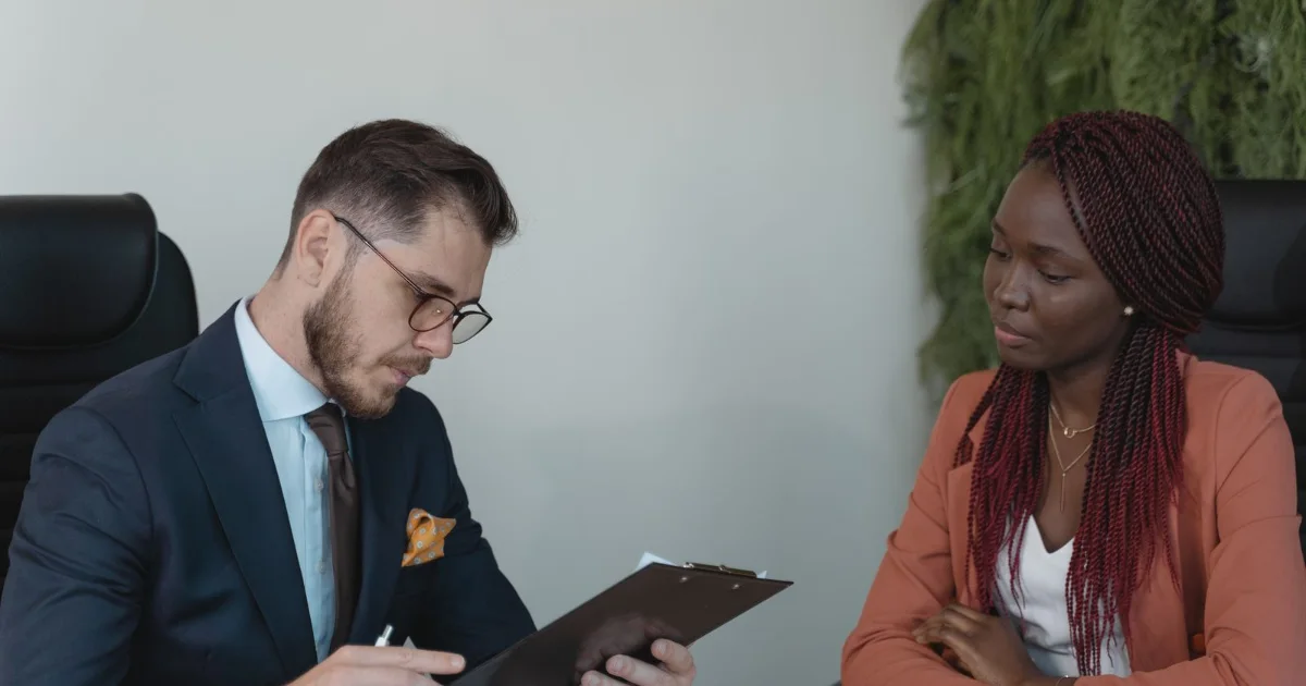Employee meeting with a manager in an office