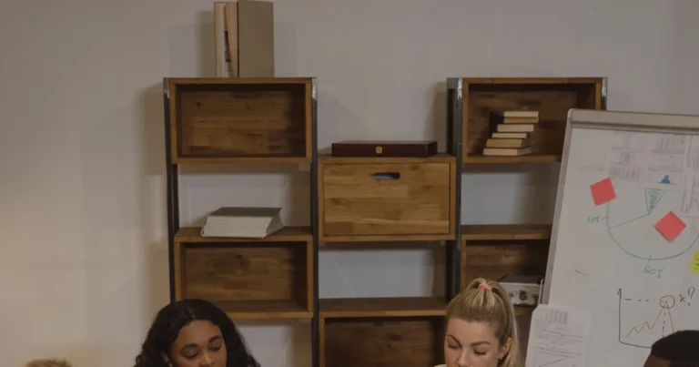 Colleagues discussing a workplace issue at a table