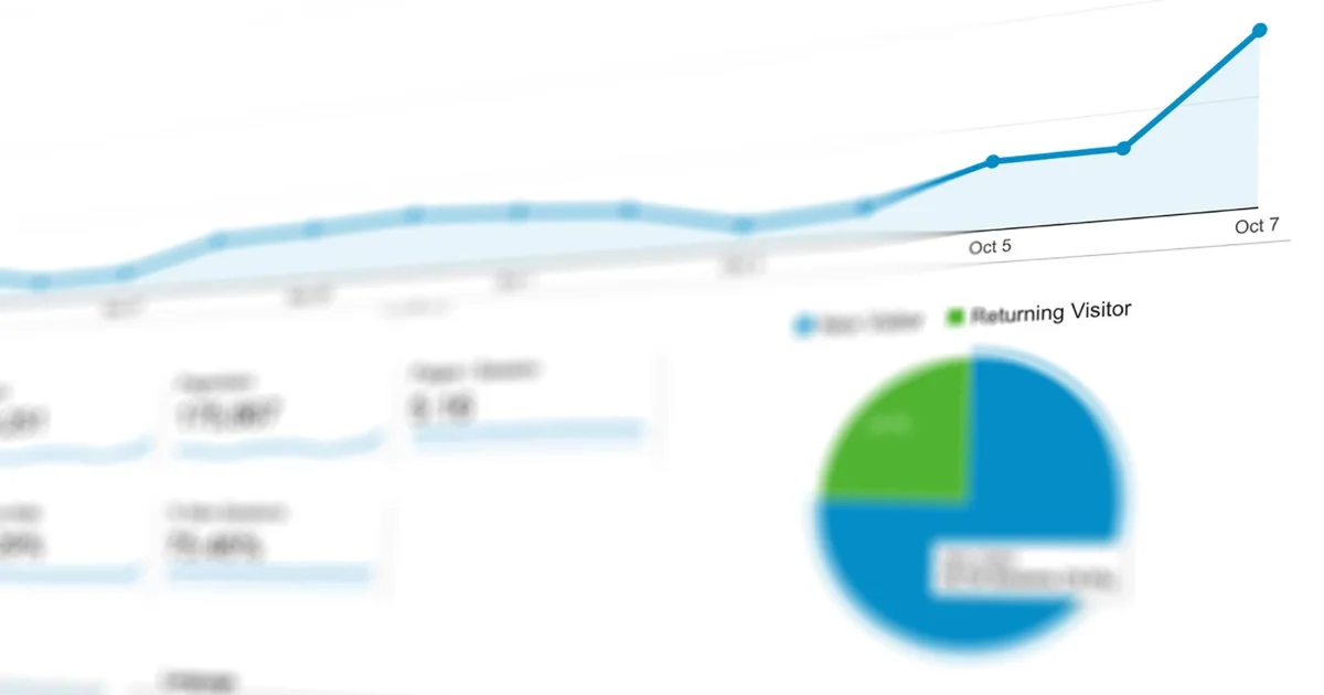 Reports and charts spread on a desk during a website content audit