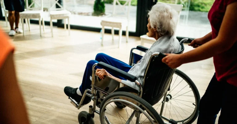 Senior resident in a wheelchair at a nursing home