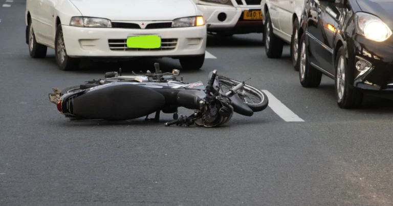A car with heavy front-end damage after a collision, a typical personal injury claim
