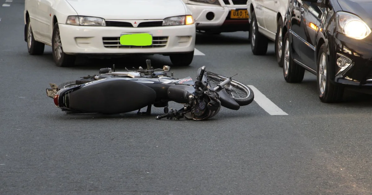 A car with heavy front-end damage after a collision, a typical personal injury claim