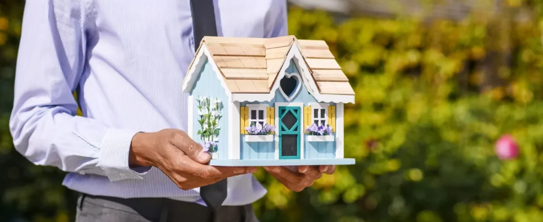 House keys on a property contract, representing real estate legal work
