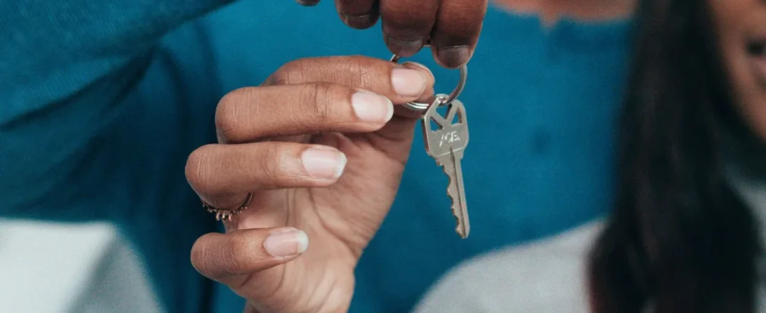 Couple holding the keys to a new home