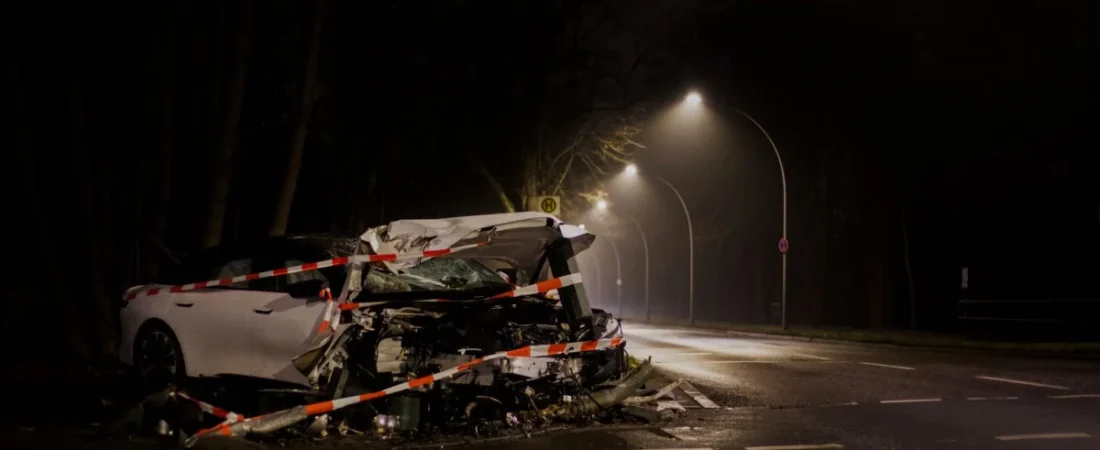 Wrecked car at night after a collision, the kind of moment personal injury marketing must reach