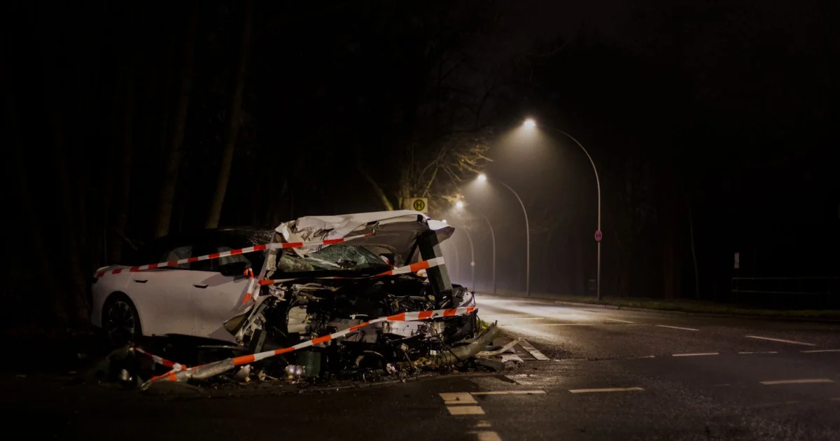 Wrecked car at night after a collision, the kind of moment personal injury marketing must reach