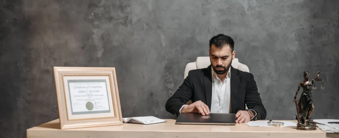 Attorney working alone at a desk in a small law office