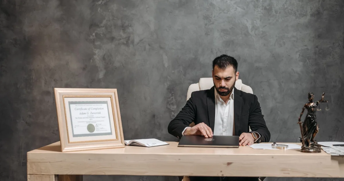 Attorney working alone at a desk in a small law office